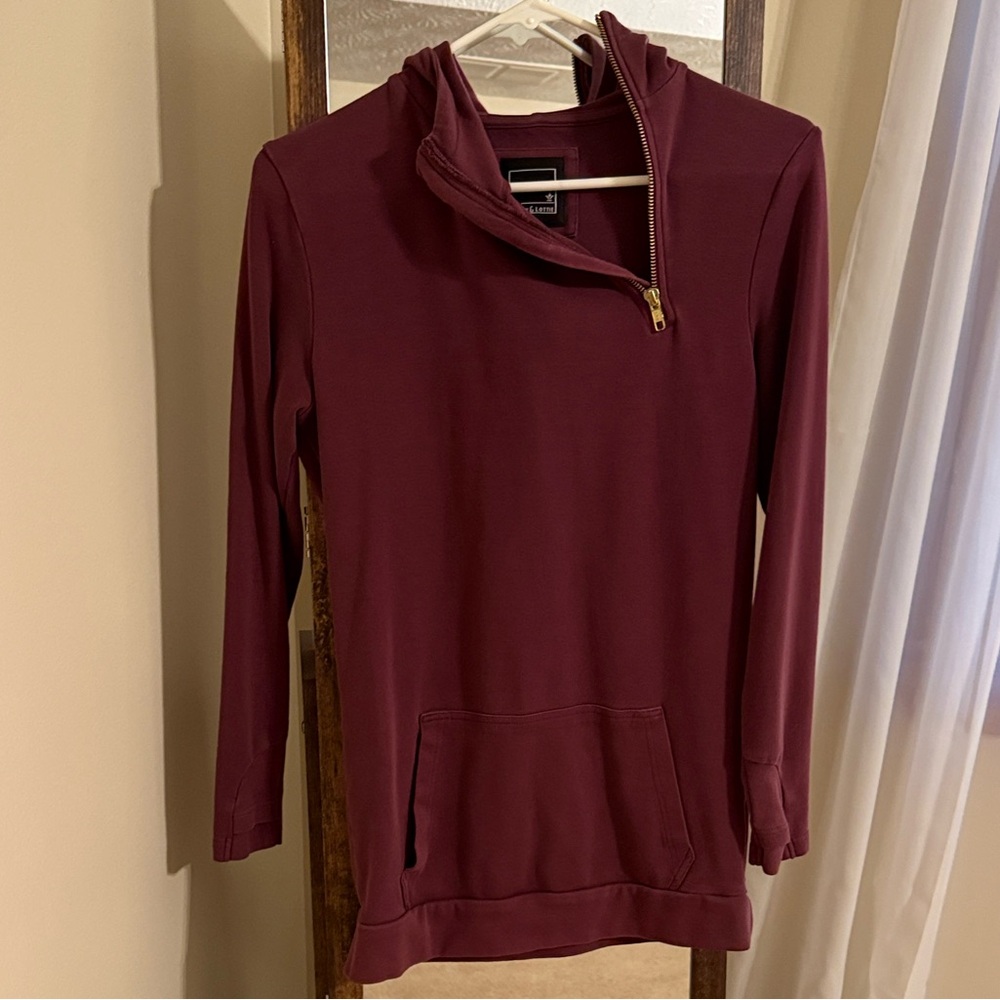 Pullover hoodie with asymmetrical zipper and front pocket